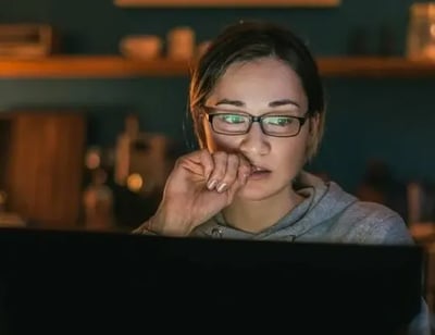 Woman Studying on Laptop